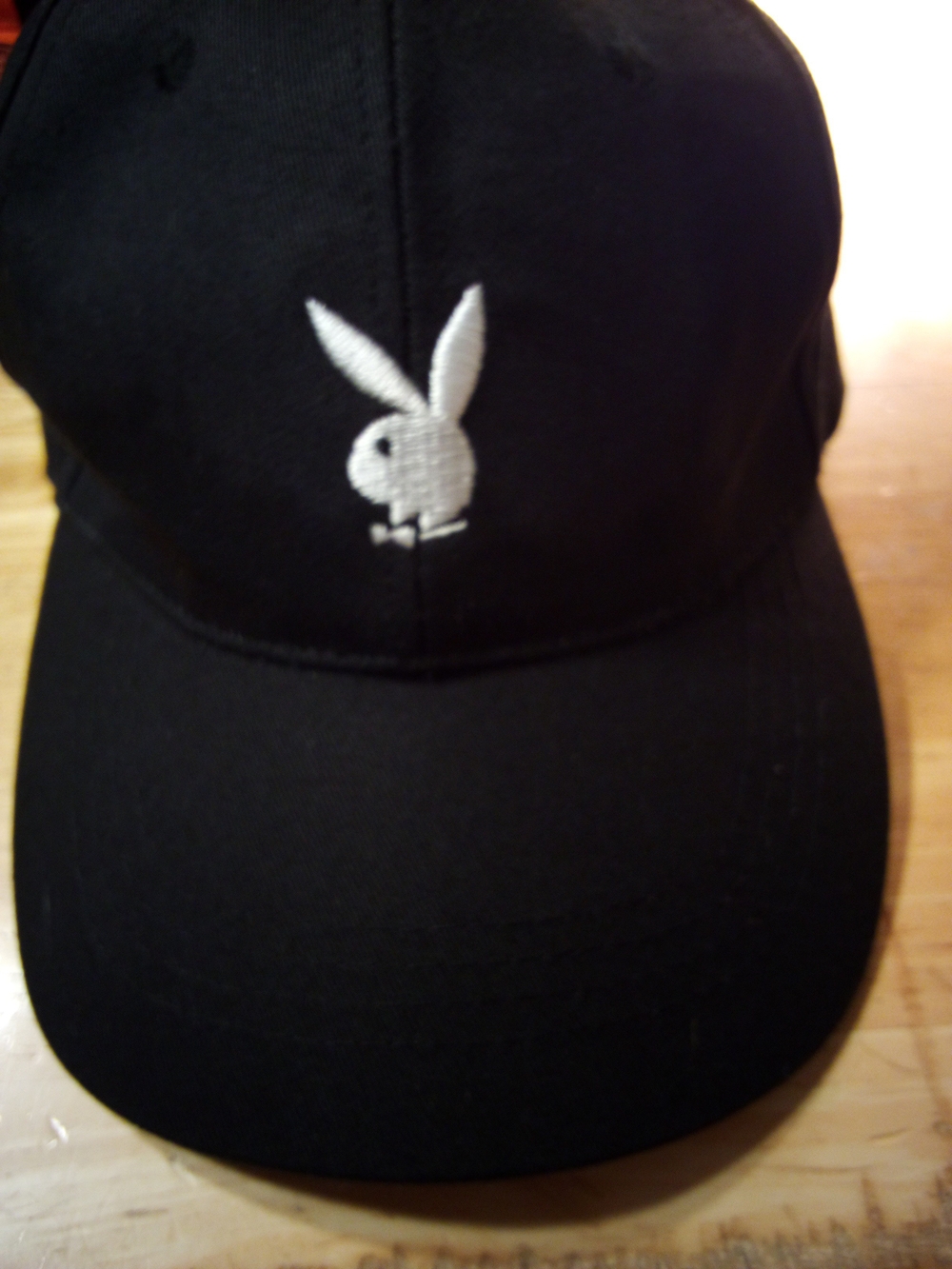 PLAYBOY Black Unisex Cap with Silver Bunny Logo .